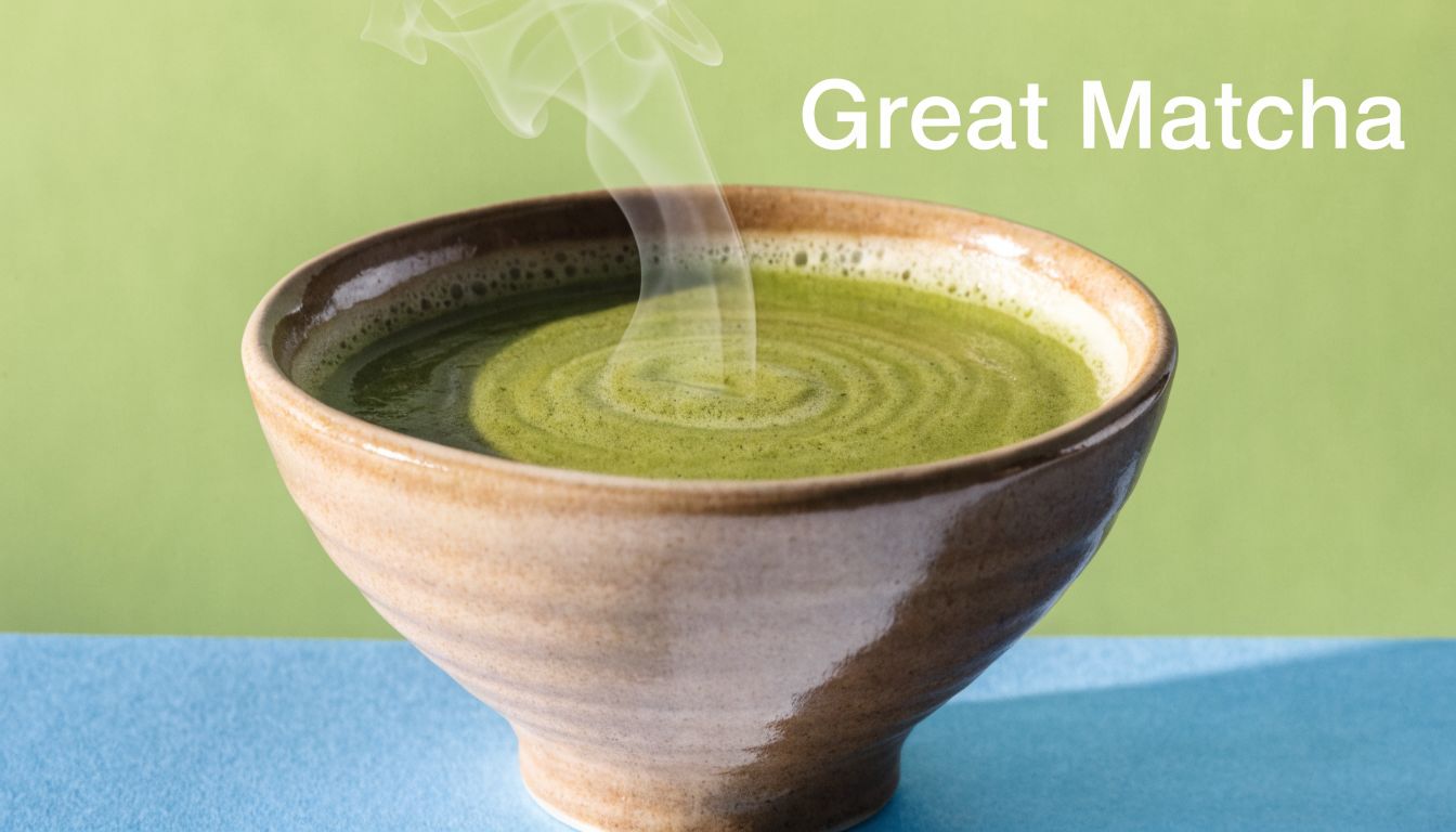 A steaming bowl of fresh green matcha tea placed on a blue surface against a green background.