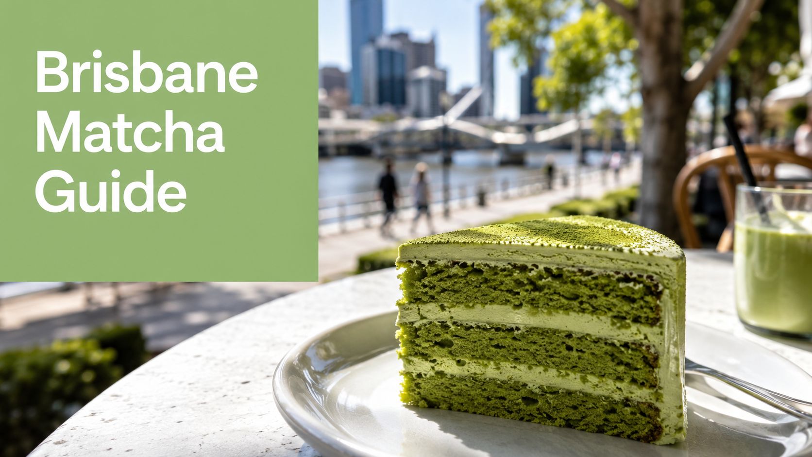 A delicious slice of matcha layered cake sits on a white plate with a river city view.